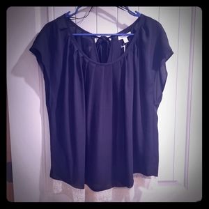 Blouse with trim on the bottom